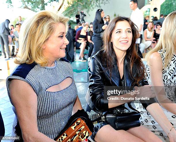 Actresses Catherine Deneuve and Charlotte Gainsbourg attend the Louis Vuitton Cruise 2016 Resort Collection shown at a private residence on May 6,...