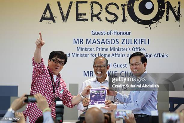 Hong actor and director , Jackie Chan , Second Minister for Home Affairs and Second Minister for Foreign Affairs, Masagos Zulkilfi and Principal &...
