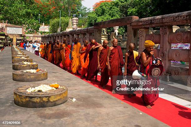 Buddhist monks circumambulate the Mahabodhi temple chanting hymns as a part of Buddha Purnima celebrations in Bodh Gaya, the place where lord Buddha...
