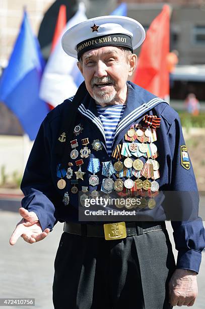 In this handout image supplied by Host photo agency / RIA Novosti, Alexander Kovalev attends a meeting of veterans, graduates of the Solovki Young...