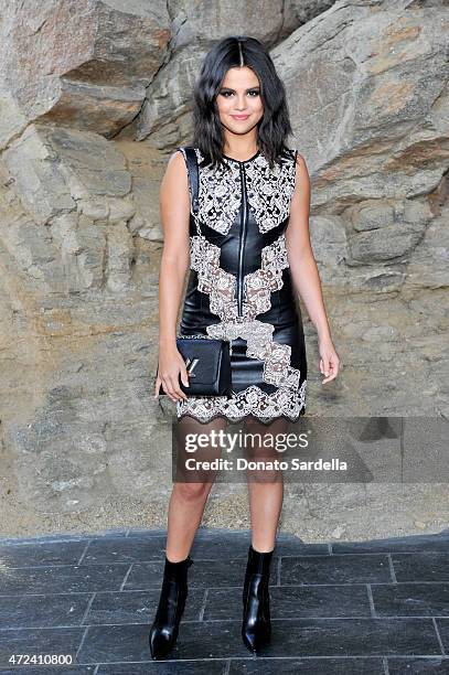 Actress/singer Selena Gomez attends the Louis Vuitton Cruise 2016 Resort Collection shown at a private residence on May 6, 2015 in Palm Springs,...