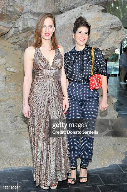 Filmmaker Liz Goldwyn and actress Marisa Tomei attend the Louis Vuitton Cruise 2016 Resort Collection shown at a private residence on May 6, 2015 in...