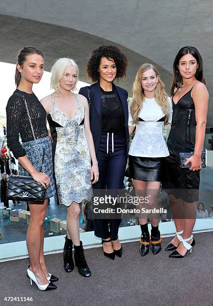 Actresses Alicia Vikander, Michelle Williams, Nathalie Emmanuel, Britt Robertson, and Adele Exarchopoulos backstage at the Louis Vuitton Cruise 2016...
