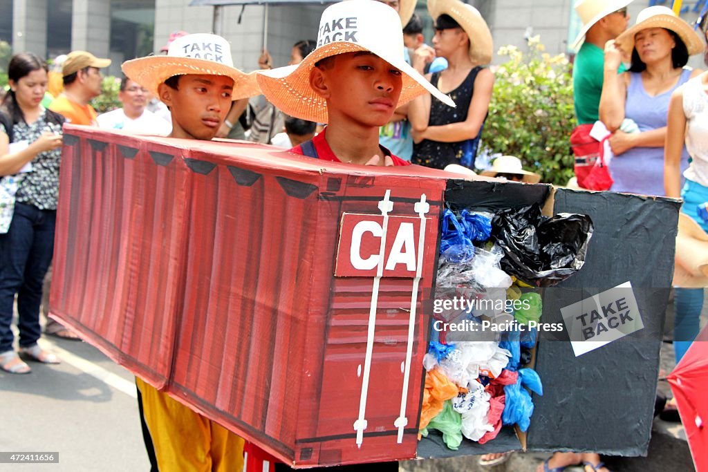 Protesters led by the Ecowaste Coalition and Piglas...