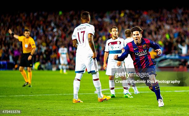 Lionel Messi of Barcelona celebrates after scoring his first goal during the first leg of UEFA Champions League semifinal match between FC Barcelona...