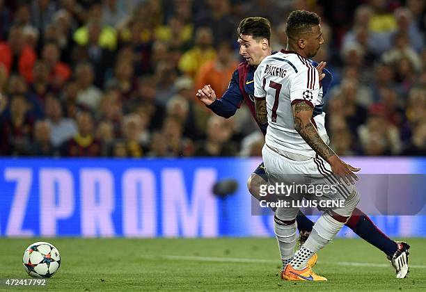 Barcelona's Argentinian forward Lionel Messi vies with Bayern Munich's defender Jerome Boateng during the UEFA Champions League football match FC...