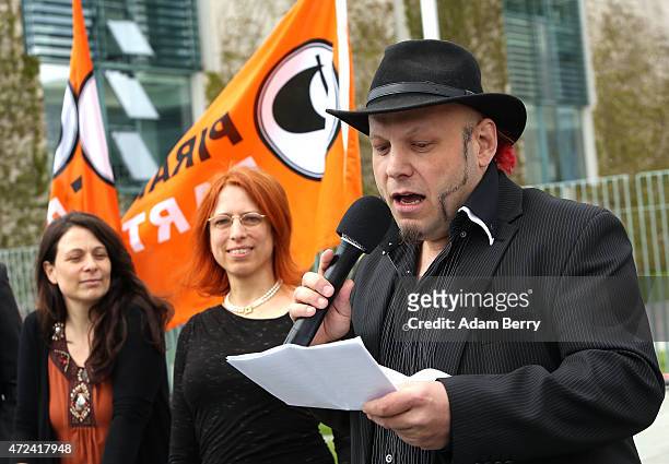 Bruno Kramm, Berlin chairman of the Pirate Party , demonstrates for governmental transparency and accountability in assessing Germany's cooperation...