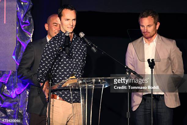 Winners of the Golden Trailer Award for Best Documentary Trailer creative director Scott Mitsui and editors Ryan Foster and Alex Lorge on stage...