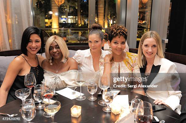 Violet Camacho, Janice "Mamma" Combs, Alicia Piazza, Tracy Mourning and Hadley Henriette attend Haute Living Haute 100 Dinner presented by Dom...