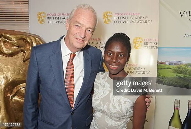 Jon Snow and wife Precious Lunga attend a lunch to celebrate Jon Snow being awarded the BAFTA Fellowship at the Corinthia Hotel London on May 7, 2015...
