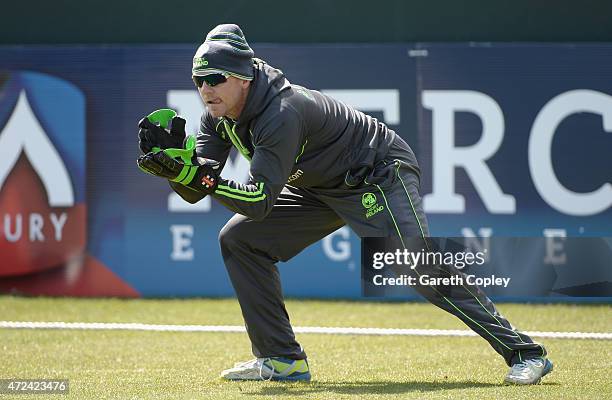 Niall O'Brien of Ireland takes part in a wicketkeeping drill during a nets session on May 7, 2015 in Malahide, Ireland.