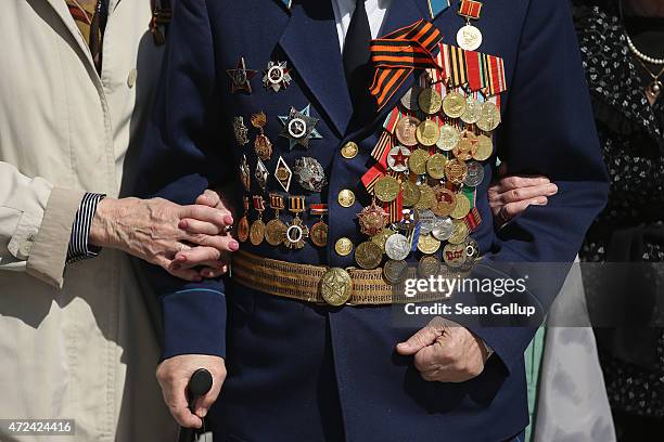 World War II veteran Viktor Gregoryovich Madveyev attends a small ceremony at the Tomb of the Unknown Soldier near Red Square ahead of celebrations...