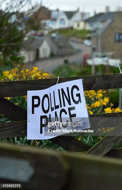 Polling Station sign attached to a gate in the tiny fishing village of Collieston on May 07, 2015 near Ellon, Scotland. The United Kingdom has gone...