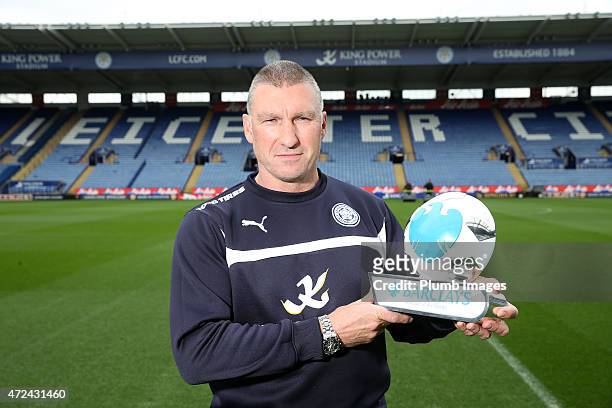 Leicester City manager Nigel Pearson is presented with the Barclays Manager of the Month Award for April 2015 at King Power Stadium on May 7, 2015 in...