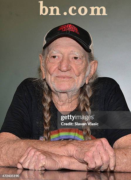 Willie Nelson signs copies of his book "It's A Long Story: My Life" at Barnes & Noble Union Square on May 7, 2015 in New York City.