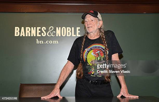 Willie Nelson signs copies of his book "It's A Long Story: My Life" at Barnes & Noble Union Square on May 7, 2015 in New York City.