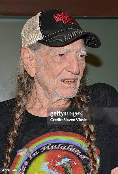 Willie Nelson signs copies of his book "It's A Long Story: My Life" at Barnes & Noble Union Square on May 7, 2015 in New York City.
