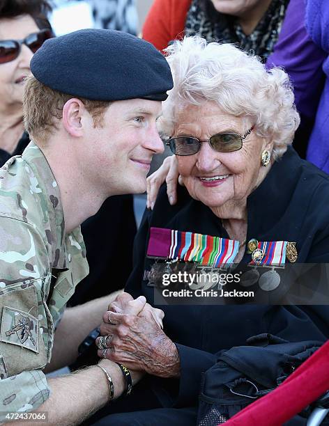 Prince Harry meets Daphne Dunne during a walkabout outside the Sydney Opera House on May 7, 2015 in Sydney, Australia. Prince Harry is visiting...