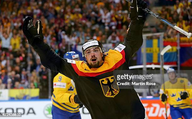 Nicolas Krammer of Germany celebrates after he scores his team's equalizing goal during the IIHF World Championship group A match between Sweden and...