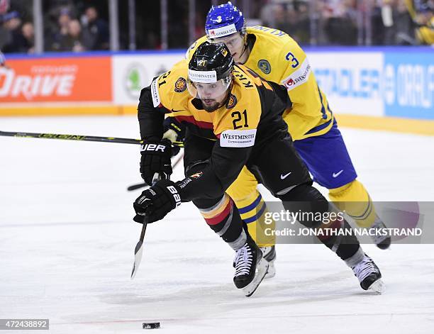 Forward Nicolas Krammer of Germany skates to score a goal during the group A preliminary round match Sweden vs Germany at the 2015 IIHF Ice Hockey...