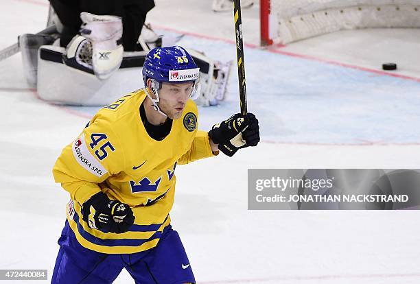 Forward Oscar Moller of Sweden celebrates after scoring a goal during the group A preliminary round match Sweden vs Germany at the 2015 IIHF Ice...