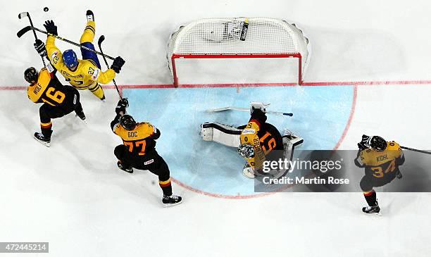 Timo Pielmeier, goaltender of Germany tends net against Sweden during the IIHF World Championship group A match between Sweden and Germany at o2...