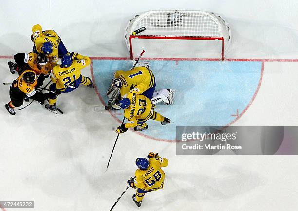 Jhonas Enroth, goaltender of Sweden tnds net against of Germany during the IIHF World Championship group A match between Sweden and Germany at o2...