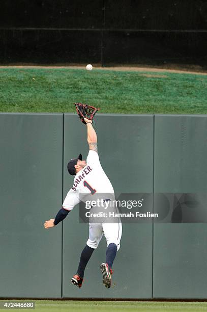 Jordan Schafer of the Minnesota Twins reaches for a ball in center field during the game against the Oakland Athletics on May 4, 2015 at Target Field...
