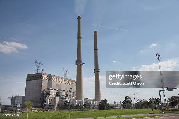 Smoke rises from the chimney at NRG Energy's Joliet Station power plant on May 7, 2015 in Joliet, Illinois. According to scientists, global carbon...