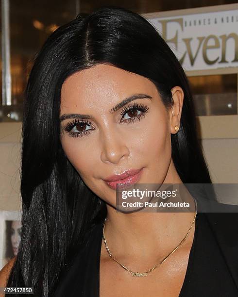 Reality TV Personality Kim Kardashian West signs copies of her new book "Selfish" at Barnes & Noble bookstore at The Grove on May 7, 2015 in Los...