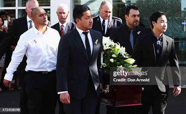 Michael Chan , brother of Andrew Chan, is seen with other pall-bearers during the funeral service for executed Bali nine member Andrew Chan at...