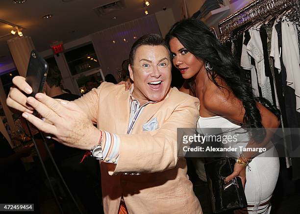 Samy and Maripily Rivera take a selfie at Studio LX during the clothing launch of Chiquinquira Delgado in collaboration with David Lerner on May 7,...