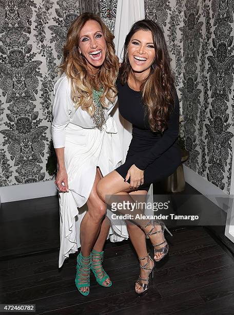 Lili Estefan and Chiquinquira Delgado pose at Studio LX during the clothing launch of Chiquinquira Delgado in collaboration with David Lerner on May...