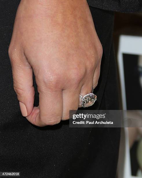 Reality TV Personality Kim Kardashian West , jewelry detail, signs copies of her new book "Selfish" at Barnes & Noble bookstore at The Grove on May...