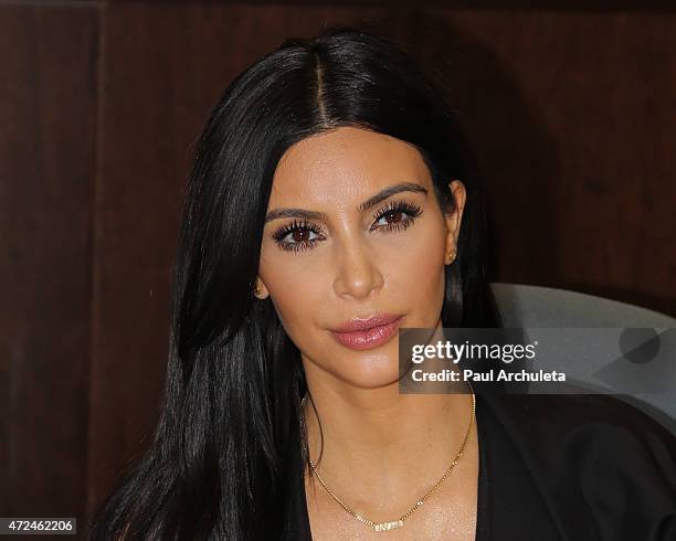 Reality TV Personality Kim Kardashian signs copies of her new book "Selfish" at Barnes & Noble bookstore at The Grove on May 7, 2015 in Los Angeles,...