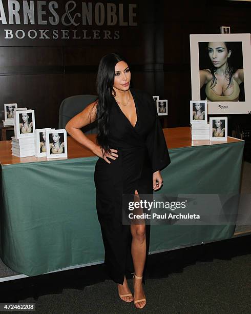 Reality TV Personality Kim Kardashian signs copies of her new book "Selfish" at Barnes & Noble bookstore at The Grove on May 7, 2015 in Los Angeles,...