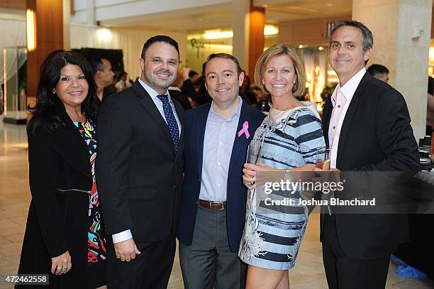 Prudence Maraia, Louis Schillace, Jeff Adams, Molly Unger and Eric Unger attend Cocktails & Couture hosted by Lisa Rinna at Westfield Topanga on May...