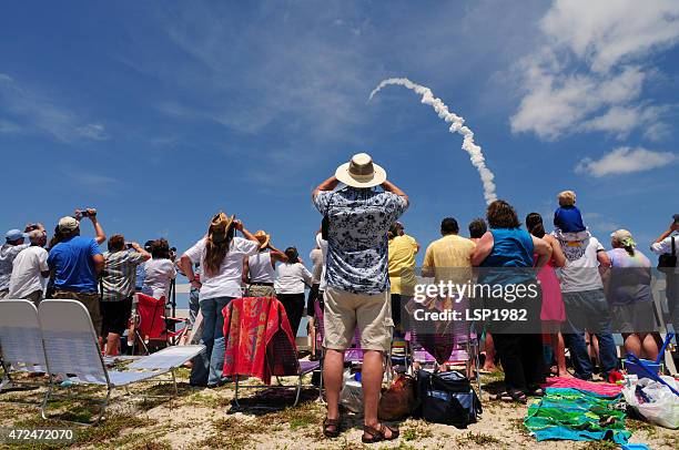 people watching space shuttle launched into space. - cape canaveral stock pictures, royalty-free photos & images
