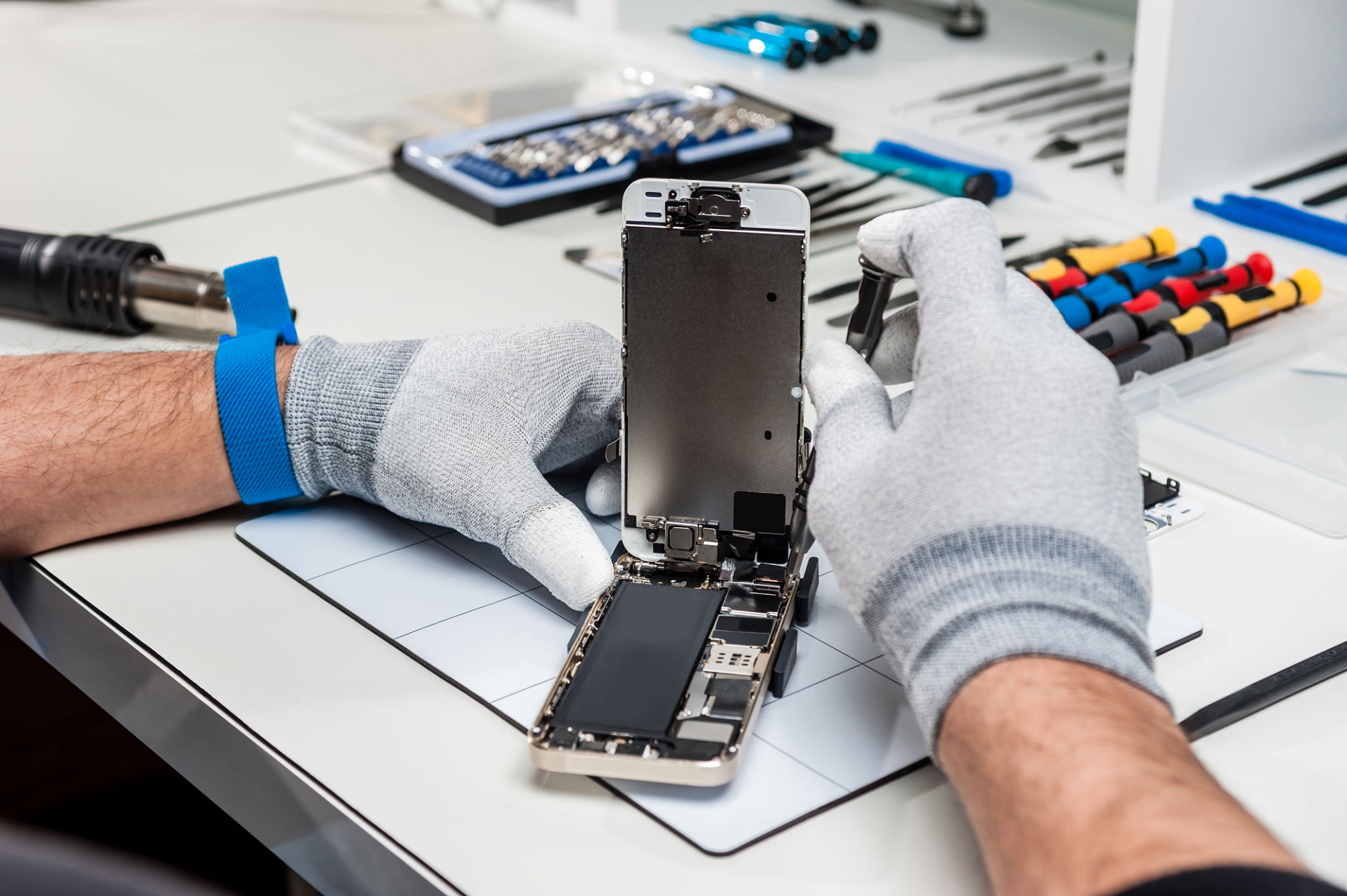 technician repairing phone