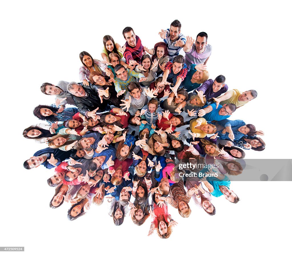Above view of large group of people with raised arms.