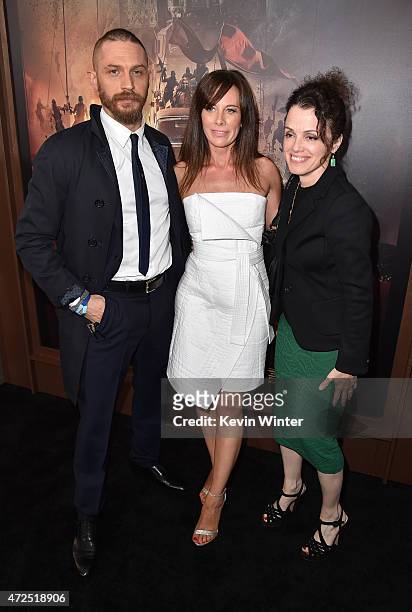 Actor Tom Hardy, Kelly Marcel and Warner Bros. Pictures Executive Vice President of Production Courtenay Valenti attend the premiere of Warner Bros....
