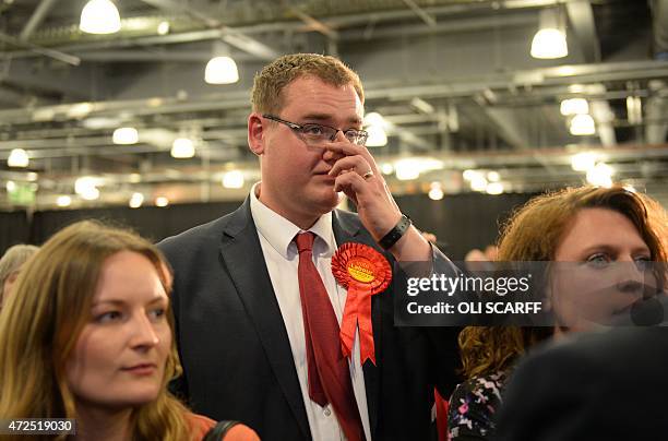 Disappointed Labour Party supporters listen to Labour MP Caroline Flint speak at Doncaster Racecourse, northern England, on May 8, 2015. Prime...