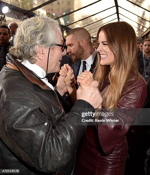 Writer/Director/Producer George Miller and actress Riley Keough attend the premiere of Warner Bros. Pictures' "Mad Max: Fury Road" at TCL Chinese...