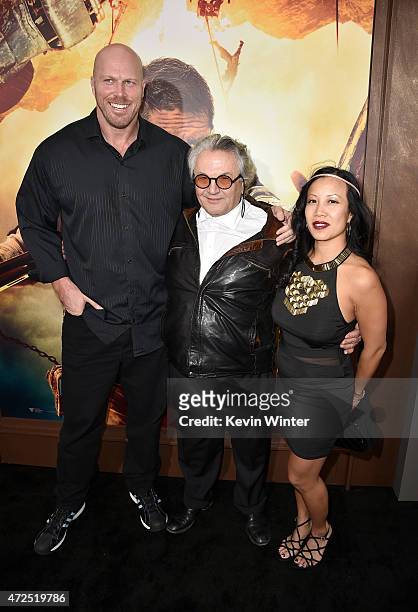 Actor Nathan Jones, Writer/Director/Producer George Miller and guest attend the premiere of Warner Bros. Pictures' "Mad Max: Fury Road" at TCL...