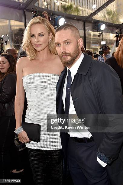 Actors Charlize Theron and Tom Hardy attend the premiere of Warner Bros. Pictures' "Mad Max: Fury Road" at TCL Chinese Theatre on May 7, 2015 in...