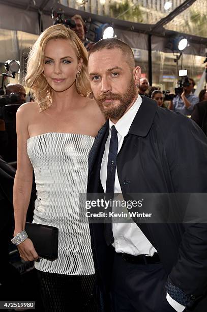 Actors Charlize Theron and Tom Hardy attend the premiere of Warner Bros. Pictures' "Mad Max: Fury Road" at TCL Chinese Theatre on May 7, 2015 in...