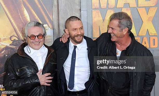 Director George Miller, actors Tom Hardy and Mel Gibson arrive for the premiere of Warner Bros. Pictures' "Mad Max: Fury Road" held at TCL Chinese...