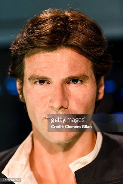 Wax figure of the actor Harrison Ford as the Star Wars character Han Solo is displayed on the occasion of Madame Tussauds Berlin Presents New Star...