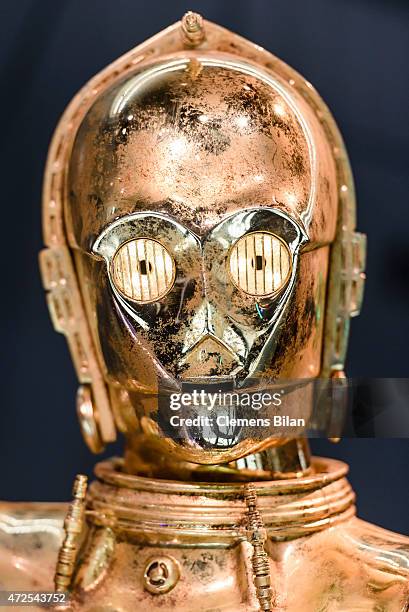 Wax figure of the Star Wars robot character C-3PO is displayed on the occasion of Madame Tussauds Berlin Presents New Star Wars Wax Figures at Madame...