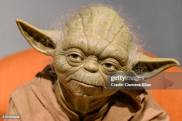 Wax figure of the Star Wars character Yoda is displayed on the occasion of Madame Tussauds Berlin Presents New Star Wars Wax Figures at Madame...